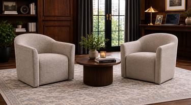 Gray tritono accent chair in a masculine, dark wood office