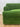 Close-up of the green Fontaine loveseat's curved arm and seat cushion
