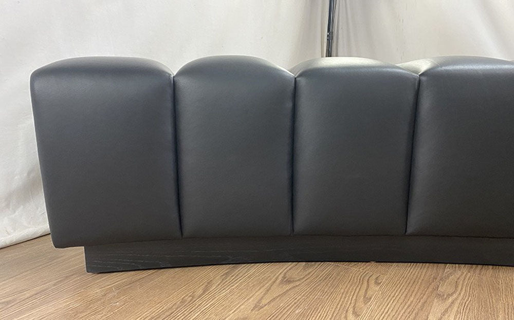 Detail view, curved channeled bench