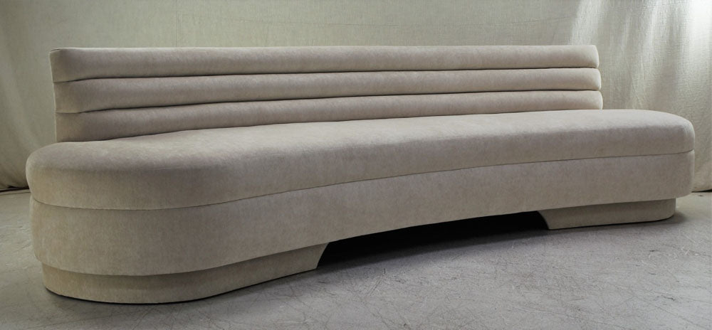 Custom curved sofa with horizontal channels