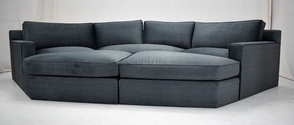 Custom angled sofa with ottomans