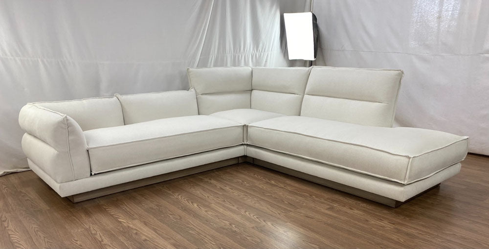 Custom pillow-channeled sectional