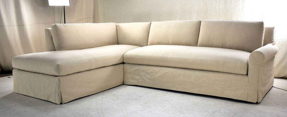 Custom roll-arm slipcovered sectional