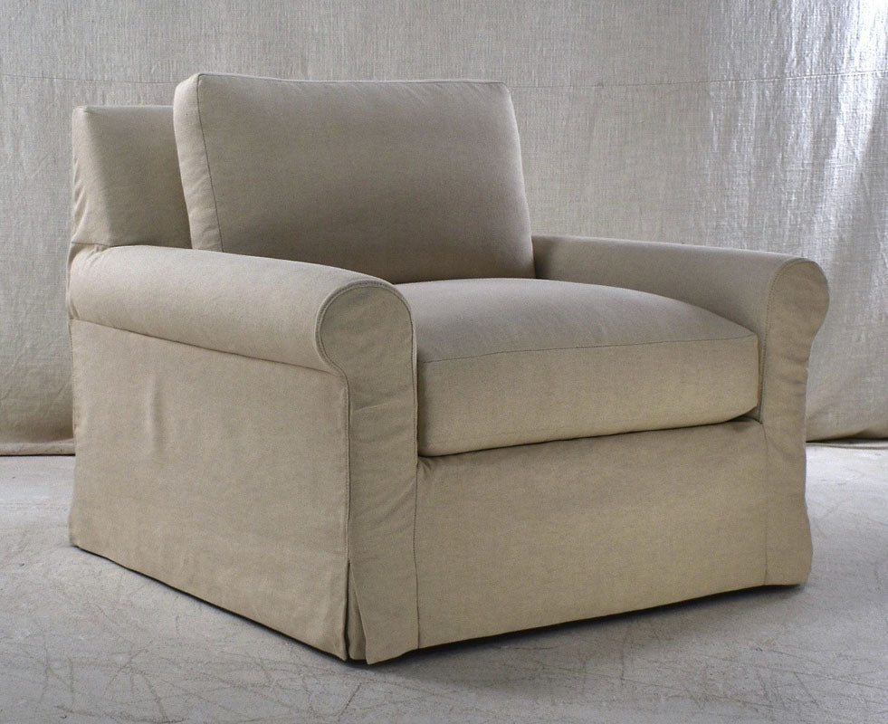 Custom roll-arm slipcovered swivel chair