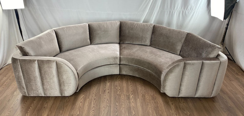 Curved sectional with outer vertical channels