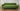 Front view of the green Salvatore sofa with a buttoned back